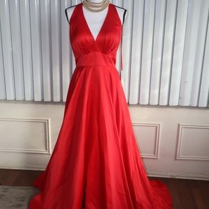 Gorgeous red gown with slit by Shail K
